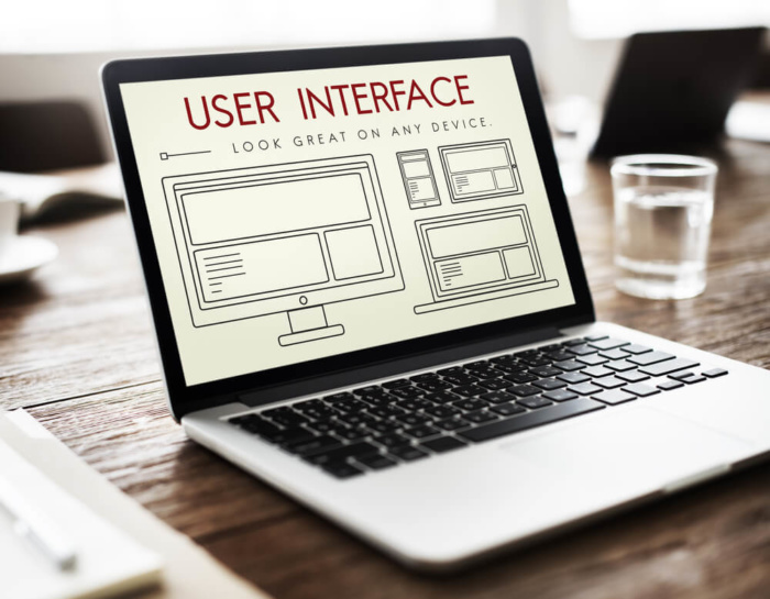 laptop com tela em tema de User Interface