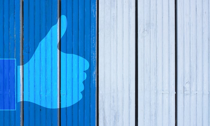 Like Thumb on the wooden background